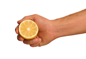 Image showing Hand with lemon