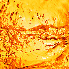 Image showing orange water with splash background