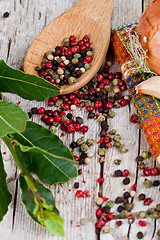 Image showing peppercorns and bay leaves