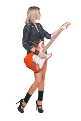 Image showing Young woman with guitar on white background