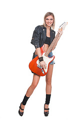 Image showing Young woman with guitar on white background