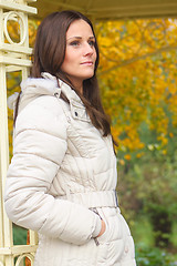 Image showing Leaning lady in gazebo