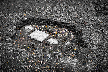 Image showing Tarmac road with big holes in Belgium