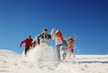 Image showing friends have fun at winter on fresh snow