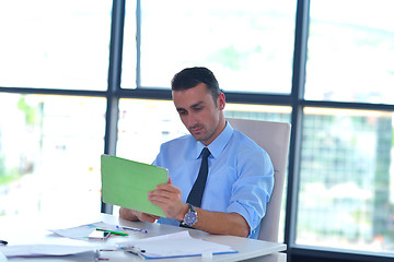 Image showing business man using tablet compuer at office