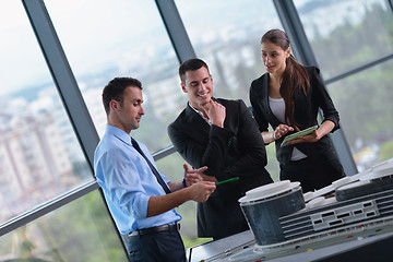 Image showing business people and engineers on meeting