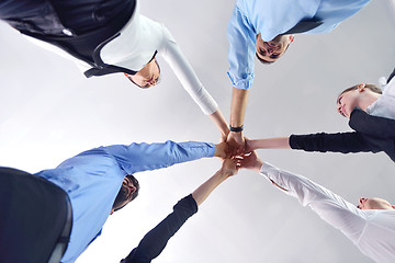 Image showing business people group joining hands