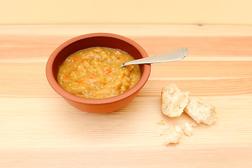 Image showing Vegetable soup with remainder of bread roll