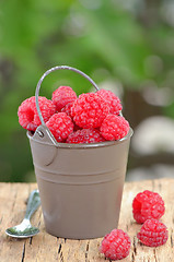 Image showing raspberry on wooden background