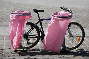 Image showing Pink litter bags