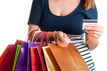 Image showing Woman Carrying Shopping Bags And Holding a Credit Card