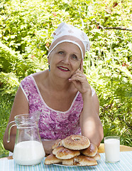 Image showing Appetizing homemade pies with fresh milk from a caring housewife