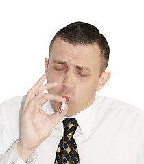 Image showing smoking male eagerly inhale cigarette caustic smoke