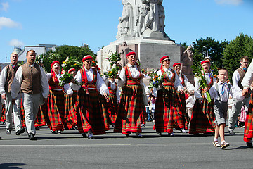 Image showing RIGA, LATVIA - JULY 06: People in national costumes at the Latvi