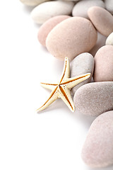 Image showing pile of stones and sea star 