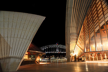 Image showing Sydney Opera House and Harbour Bridge lit at night