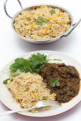 Image showing Methi lamb meal with tomato rice