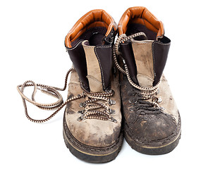 Image showing Pair of old dirty trekking boots