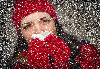 Image showing Sick Woman Blowing Her Sore Nose With Tissue and Snow