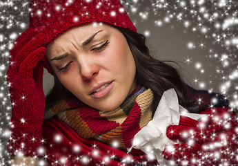 Image showing Sick Woman with Tissue and Snow Effect Surrounding