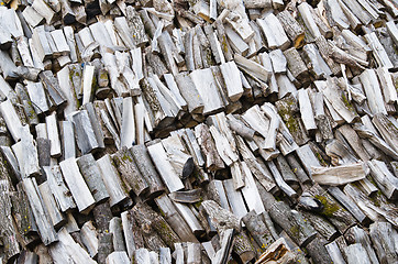 Image showing folded rows of firewood, close-up  