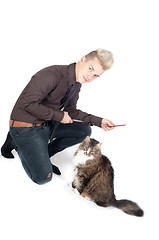 Image showing Portrait of handsome man with cat