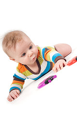 Image showing Little baby striped body lying on his tummy