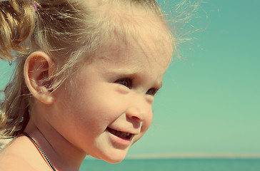 Image showing happy little girl on beach