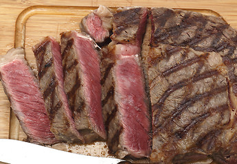 Image showing Wagyu steak cut on board