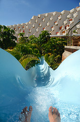 Image showing Water slide and feet