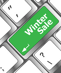 Image showing winter sale on computer keyboard key button