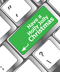 Image showing Computer keyboard key with have a holly jolly christmas words