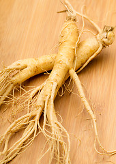 Image showing Fresh Ginseng on the wooden background