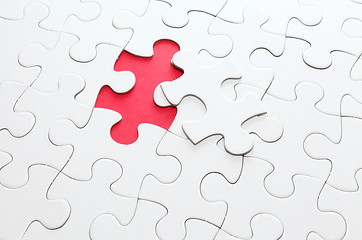 Image showing Incomplete puzzle with missing piece