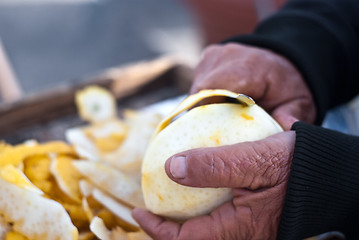 Image showing hands cutting a citron