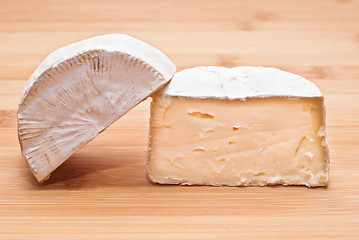 Image showing Soft cheese on a wooden board