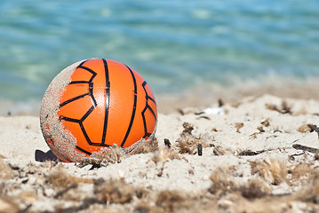 Image showing Red ball in the sand