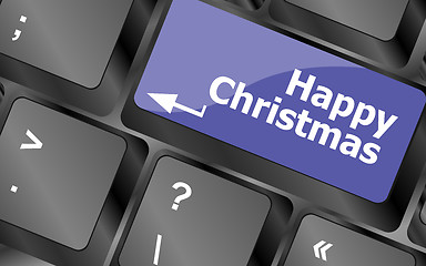 Image showing happy christmas message, keyboard enter key button