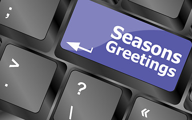 Image showing Computer keyboard with seasons greetings keys - holiday concept