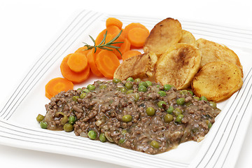 Image showing Plate of mince and peas with carrots and potato