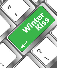 Image showing winter kiss on computer keyboard key button