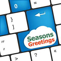 Image showing Computer keyboard with seasons greetings keys - holiday concept