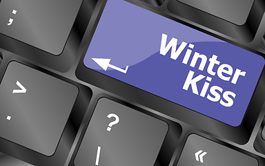 Image showing winter kiss on computer keyboard key button
