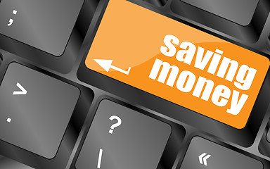 Image showing saving money for investment with a button on computer keyboard