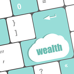 Image showing cloud icon with wealth word on computer keyboard key