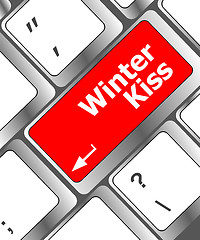 Image showing winter kiss on computer keyboard key button