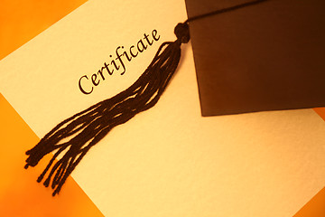 Image showing certificate and graduation cap, top view