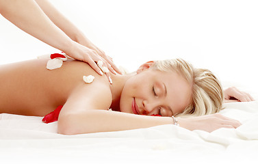 Image showing professional massage with flower petals #2