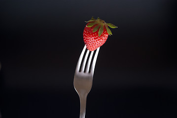 Image showing fresh strawberry on fork 