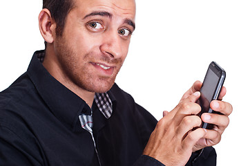 Image showing an handsome businessman with a smartphone